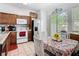 Bright kitchen area, featuring modern appliances and adjacent to a delightful breakfast nook at 2662 Mayaguana St, Kissimmee, FL 34747