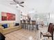 Spacious living room with bar seating and open layout at 2662 Mayaguana St, Kissimmee, FL 34747