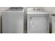 This laundry room features a Whirlpool dryer and a Samsung washing machine at 269 St Georges Cir, Eagle Lake, FL 33839