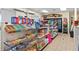 Bright store interior featuring well-stocked shelves with a variety of snacks and drinks at 2785 Almaton Loop # 204, Kissimmee, FL 34747