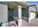 Inviting front entrance with stone accents, leading to the garage and front door at 280 Caryota Ct, New Smyrna Beach, FL 32168
