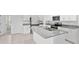 Well-appointed kitchen with granite countertops, stainless appliances, and ample storage space at 280 Caryota Ct, New Smyrna Beach, FL 32168