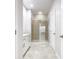 Stylish bathroom featuring a glass shower and tiled flooring at 3000 Laurel Park Ln # 202, Kissimmee, FL 34741