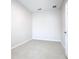 Bedroom featuring neutral paint, and a white door at 3000 Laurel Park Ln # 202, Kissimmee, FL 34741