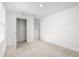 Bright and airy bedroom featuring an open closet with carpet floors at 3039 Meleto Blvd, New Smyrna Beach, FL 32168