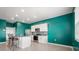 Bright kitchen featuring granite countertops, stainless steel appliances, and sleek cabinets at 3039 Meleto Blvd, New Smyrna Beach, FL 32168