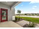 Charming patio boasts tranquil pond views, ideal for relaxing and entertaining at 3039 Meleto Blvd, New Smyrna Beach, FL 32168
