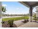 Relaxing covered patio offers a tranquil pond view for outdoor enjoyment at 3039 Meleto Blvd, New Smyrna Beach, FL 32168