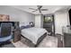 Bedroom featuring a ceiling fan, dresser, carpet and natural lighting at 3063 Mandolin Dr, Kissimmee, FL 34744