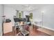Home office with hardwood floors, a ceiling fan, and natural light at 3063 Mandolin Dr, Kissimmee, FL 34744