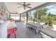 Screened-in porch with lots of natural light, offering an outdoor living space at 3063 Mandolin Dr, Kissimmee, FL 34744