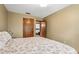 Neutral bedroom with closet, bed, and carpeted floors showing an interior perspective at 360 Pineview St, Altamonte Springs, FL 32701