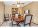 Formal dining room with classic wood furniture, elegant seating, and warm lighting at 360 Pineview St, Altamonte Springs, FL 32701
