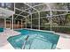Sparkling pool with screened-in enclosure provides a private outdoor oasis for relaxation and recreation at 360 Pineview St, Altamonte Springs, FL 32701