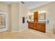 Bright bathroom with granite countertops, double sinks, and tile flooring at 369 Torgiano Dr, Ocoee, FL 34761