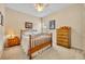 Bedroom with cozy decor, natural light, and neutral colors at 369 Torgiano Dr, Ocoee, FL 34761