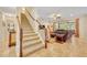 Open-concept floor plan and staircase at 369 Torgiano Dr, Ocoee, FL 34761