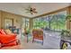 Inviting screened patio offering comfortable seating and an outdoor grilling area at 369 Torgiano Dr, Ocoee, FL 34761