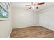 Bright bedroom with laminate floors, a window and closet at 384 Zinnia Dr, Casselberry, FL 32707
