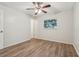 Bedroom offering laminate flooring and a ceiling fan at 384 Zinnia Dr, Casselberry, FL 32707