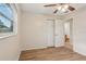 This bedroom boasts hardwood floors, a closet, and an ensuite bathroom for optimal living at 384 Zinnia Dr, Casselberry, FL 32707