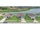 An aerial view showcasing the home's location near a pond and walking trails at 392 Citrine Loop, Kissimmee, FL 34758