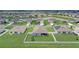 Well-maintained backyards with lush green grass and white picket fences in a desirable residential community at 392 Citrine Loop, Kissimmee, FL 34758