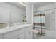 Clean, full bathroom with a combined shower and tub and a modern vanity providing a functional layout at 392 Citrine Loop, Kissimmee, FL 34758