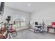 A spacious office area featuring neutral carpet, and a window view at 392 Citrine Loop, Kissimmee, FL 34758