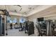 Modern gym with state-of-the-art fitness equipment and large windows for a bright and motivating workout space at 4209 Barbuda Ln, Kissimmee, FL 34758