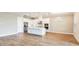 Spacious kitchen with stainless steel appliances and large center island at 4209 Barbuda Ln, Kissimmee, FL 34758
