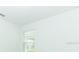 Light-filled bedroom with neutral walls and a large window at 491 Wayland Dr, Haines City, FL 33844