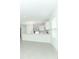 Open floor plan view of kitchen featuring bar seating and stainless appliances at 491 Wayland Dr, Haines City, FL 33844