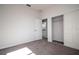 Spacious bedroom showcasing closet with open door and bathroom at 508 Churchill Pl, Poinciana, FL 34759