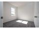 Bright bedroom filled with natural light, neutral paint, and plush carpeting at 508 Churchill Pl, Poinciana, FL 34759