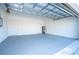 Spacious garage with ample storage space and durable flooring at 508 Churchill Pl, Poinciana, FL 34759