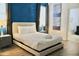 Serene bedroom with modern decor, a plush bed, and elegant lighting, creating a relaxing retreat at 5273 Oakbourne Ave, Davenport, FL 33837