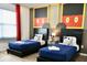 Bedroom with two beds and a Mickey Mouse themed decor at 5273 Oakbourne Ave, Davenport, FL 33837