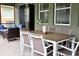 Outdoor patio featuring a dining table, chairs, and lounge furniture for relaxation at 5273 Oakbourne Ave, Davenport, FL 33837