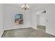 Charming dining room featuring light tile floors and arched entryways, perfect for formal dining and gatherings at 5505 W Magnolia Ave, Port Orange, FL 32127
