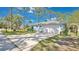 Charming single-story home with well-manicured lawn, inviting curb appeal, and attached two-car garage at 5505 W Magnolia Ave, Port Orange, FL 32127