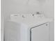 Modern, all-white, side-by-side washer and dryer are ready for laundry duties at 5505 W Magnolia Ave, Port Orange, FL 32127