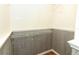 Walk-in closet with shelving and faux wood paneling at 656 Lake Charm Dr, Oviedo, FL 32765