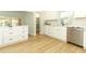 Modern kitchen features stainless steel appliances and bright lighting at 656 Lake Charm Dr, Oviedo, FL 32765