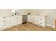 Kitchen featuring stainless steel appliances, white cabinets, and marble countertops at 656 Lake Charm Dr, Oviedo, FL 32765