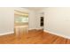 Spacious living room flows to an open floor plan with a peek to an updated kitchen at 656 Lake Charm Dr, Oviedo, FL 32765