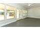 Sun room featuring large windows, French doors, and a ceiling fan at 656 Lake Charm Dr, Oviedo, FL 32765