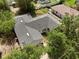Aerial view of home with a new roof and well-maintained landscaping at 672 Reindeer Dr, Kissimmee, FL 34759