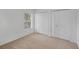 Bright bedroom features a large window and a convenient double-door closet at 672 Reindeer Dr, Kissimmee, FL 34759
