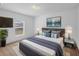 Cozy main bedroom featuring a comfortable bed, stylish décor and a serene ambiance for relaxation at 672 Reindeer Dr, Kissimmee, FL 34759